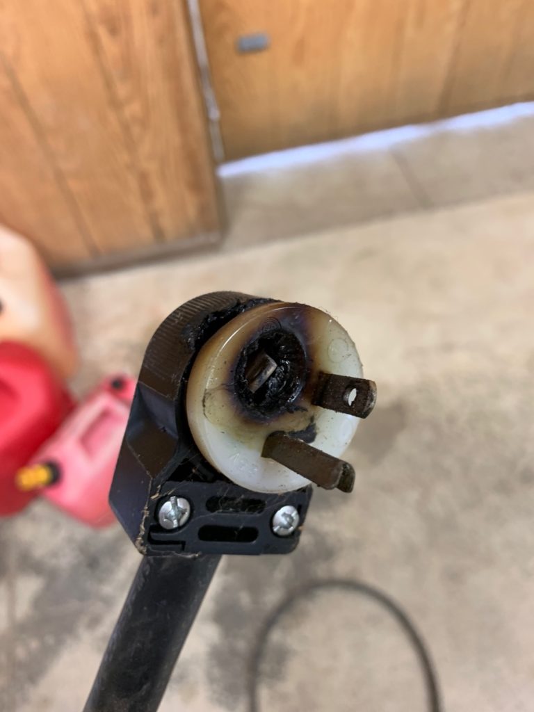 A scorched and melted plug.