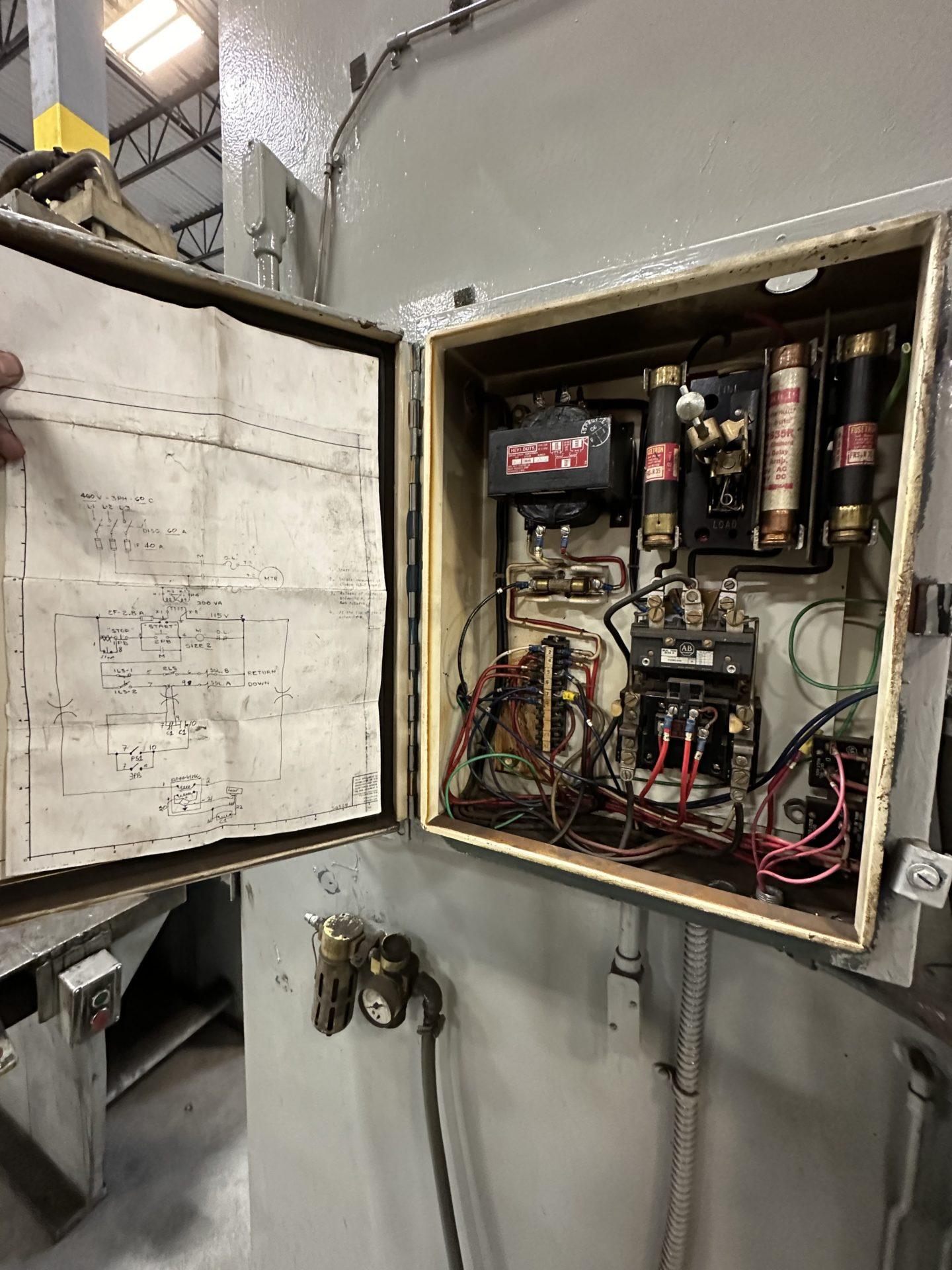 Open control cabinet for old 3 phase press.